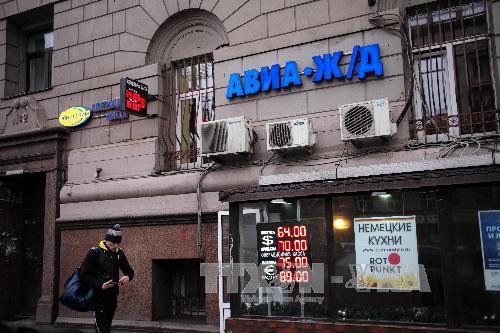 Đồng ruble Nga hồi phục mạnh nhờ biện pháp bán USD ảnh 1